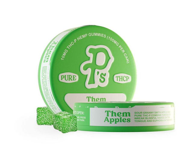 Green circular container of Pushin P's Pure THCP Gummies with white logo, alongside smaller container labeled "Them Apples" and two green sugar-coated gummy cubes, showcasing hemp-derived edible products